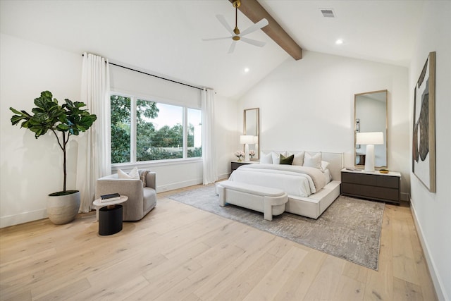 bedroom with light wood-style flooring, vaulted ceiling with beams, baseboards, and visible vents