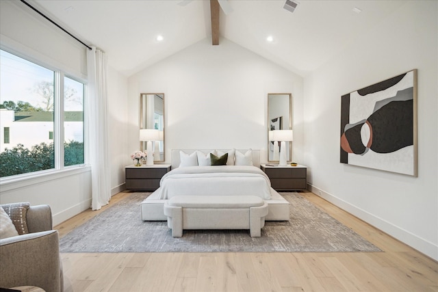 bedroom featuring visible vents, baseboards, lofted ceiling with beams, recessed lighting, and wood finished floors