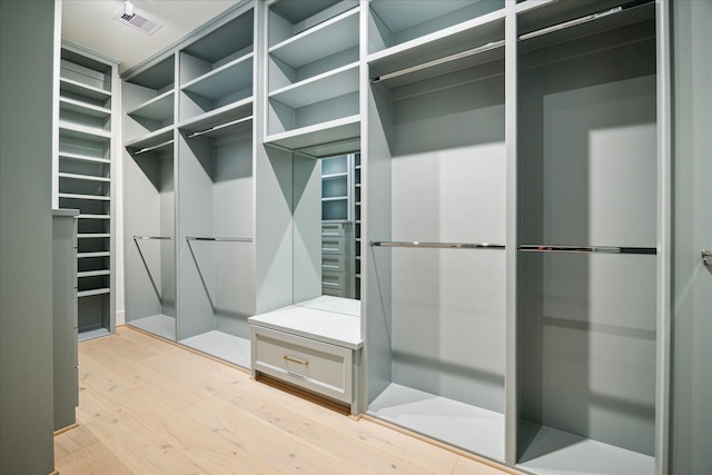 spacious closet with visible vents and light wood finished floors