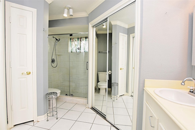 full bath with tile patterned floors, toilet, a shower stall, crown molding, and vanity