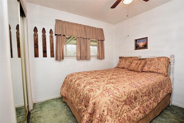 carpeted bedroom featuring baseboards and a ceiling fan