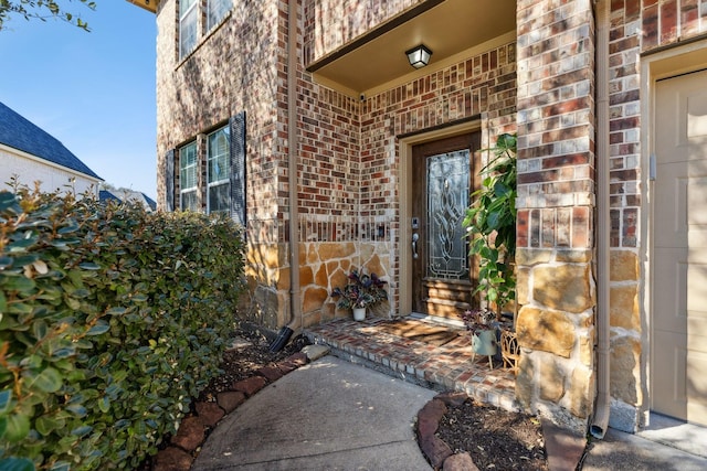 entrance to property with brick siding