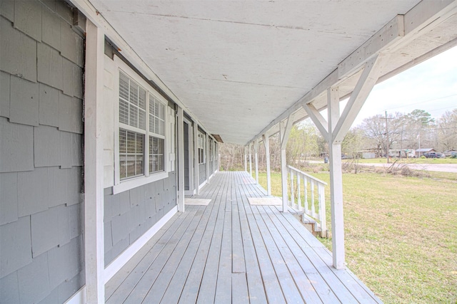 deck featuring a yard