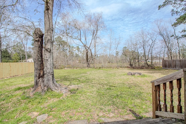 view of yard with fence