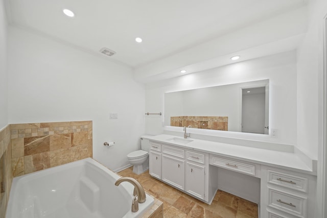 bathroom featuring vanity, toilet, a bath, and recessed lighting