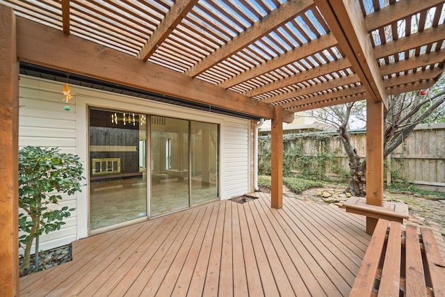 wooden terrace with fence and a pergola