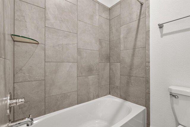 16174 Rustling Woods Rd, Conroe, TX 77302 - bathroom with toilet and washtub / shower combination