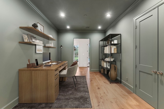 office area with light wood-style flooring, recessed lighting, baseboards, and ornamental molding