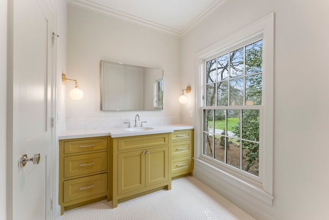 bathroom with vanity and ornamental molding