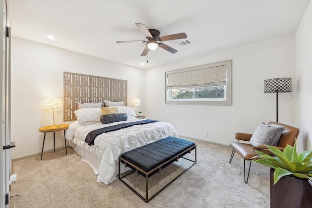 carpeted bedroom with recessed lighting, visible vents, and baseboards