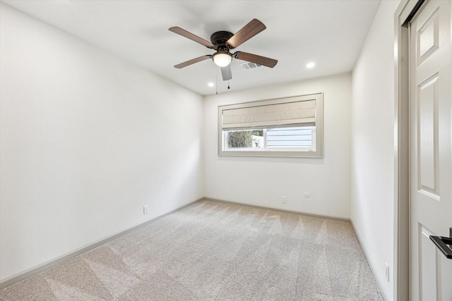 carpeted empty room featuring visible vents, recessed lighting, baseboards, and ceiling fan