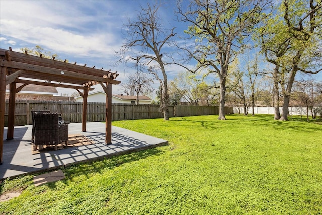 view of yard featuring a patio area, a pergola, and a fenced backyard