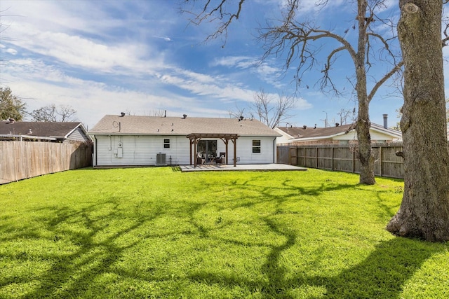 back of property with a yard, a patio, a fenced backyard, and a pergola