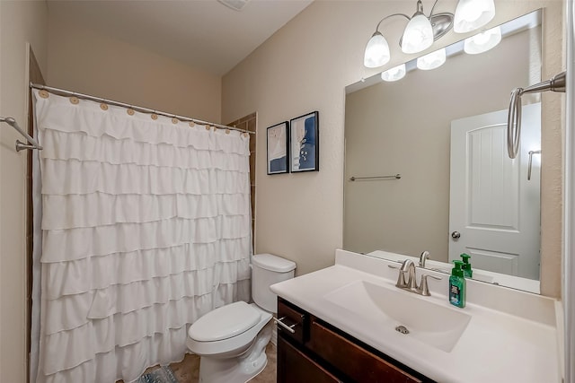 bathroom featuring a shower with curtain, toilet, and vanity