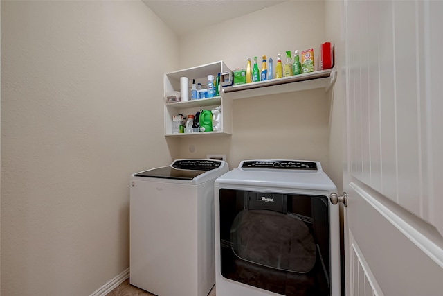 laundry area featuring laundry area and washing machine and clothes dryer