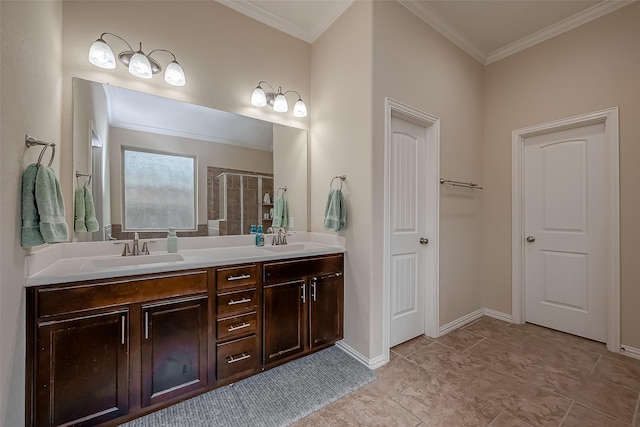 bathroom featuring a sink, double vanity, a stall shower, and crown molding