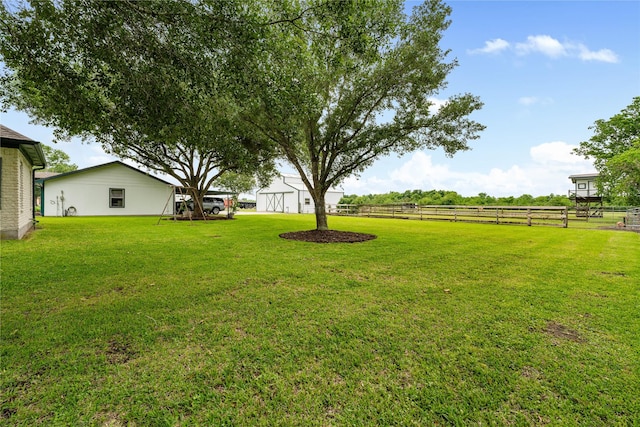 view of yard featuring fence