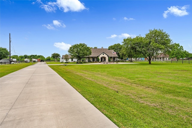 exterior space with a front yard