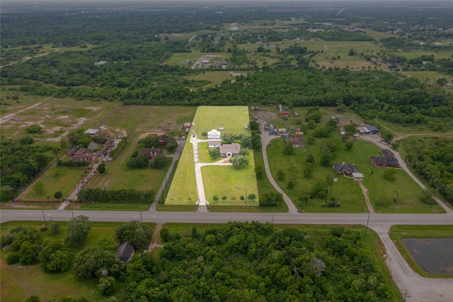 birds eye view of property featuring a rural view