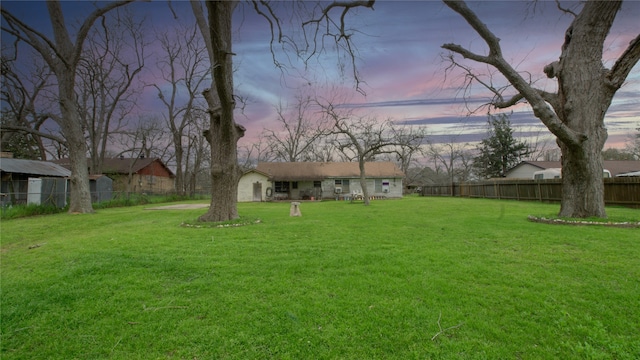 602 Riveredge Dr, Richmond, TX 77406 - yard at dusk featuring fence