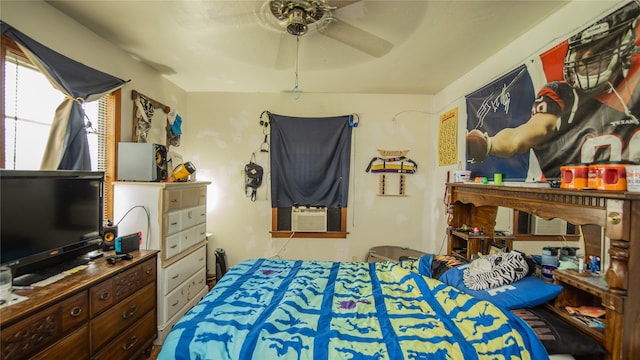602 Riveredge Dr, Richmond, TX 77406 - bedroom with cooling unit and a ceiling fan