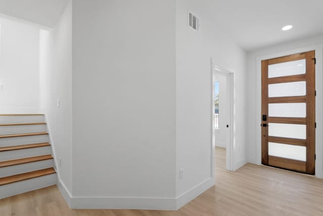 entrance foyer with recessed lighting, visible vents, baseboards, and light wood-style flooring