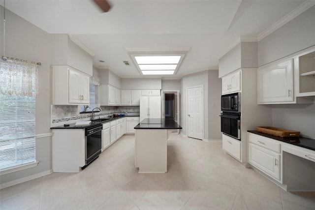 kitchen featuring a kitchen island, a sink, black appliances, dark countertops, and backsplash