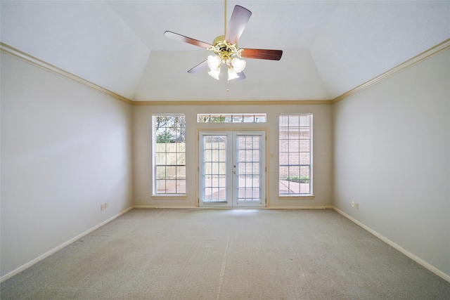 spare room with carpet flooring, a healthy amount of sunlight, french doors, and baseboards