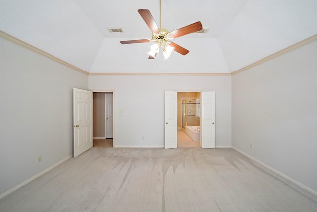 unfurnished bedroom with visible vents, light carpet, high vaulted ceiling, and baseboards