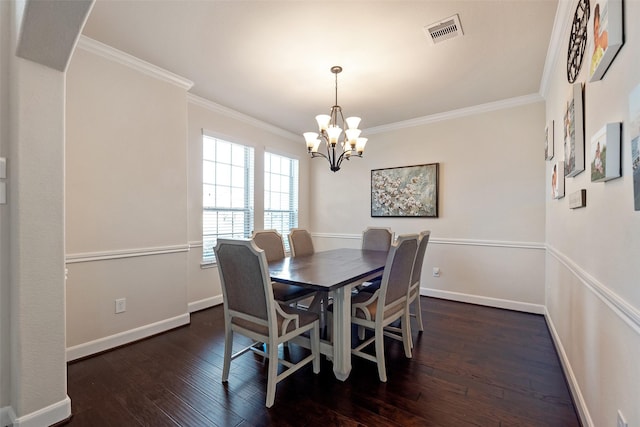 dining room featuring visible vents, crown molding, dark wood-type flooring, and baseboards