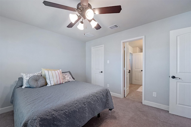 bedroom with light carpet, visible vents, a ceiling fan, and baseboards