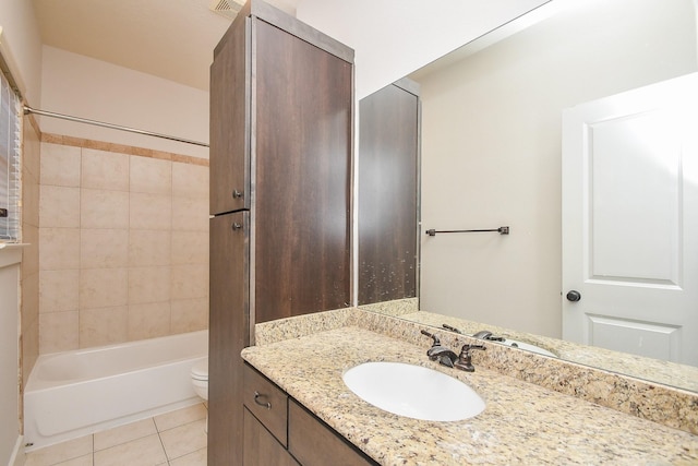 bathroom featuring vanity, visible vents, tub / shower combination, tile patterned flooring, and toilet