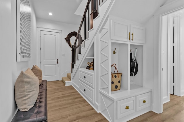 mudroom with recessed lighting and light wood-style flooring