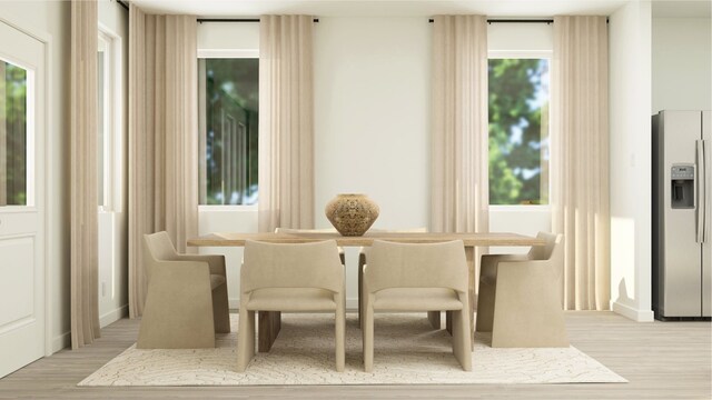 dining room with light wood-type flooring