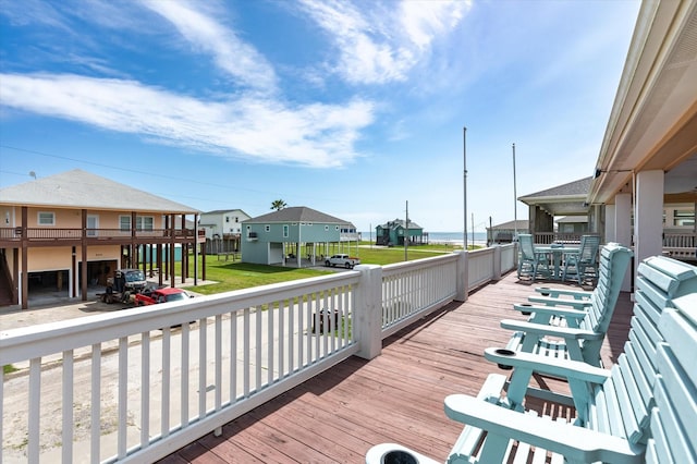 wooden terrace with a residential view