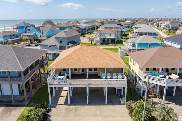 birds eye view of property featuring a residential view and a water view