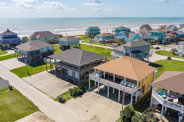 bird's eye view featuring a residential view and a water view