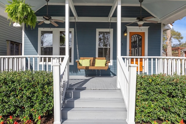 doorway to property with covered porch and ceiling fan