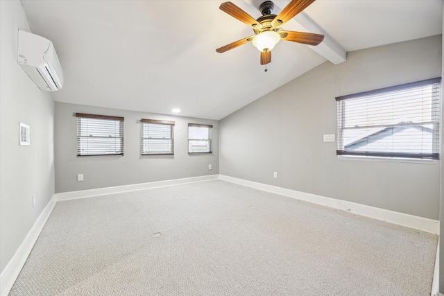 carpeted spare room with a wealth of natural light, an AC wall unit, lofted ceiling with beams, and baseboards