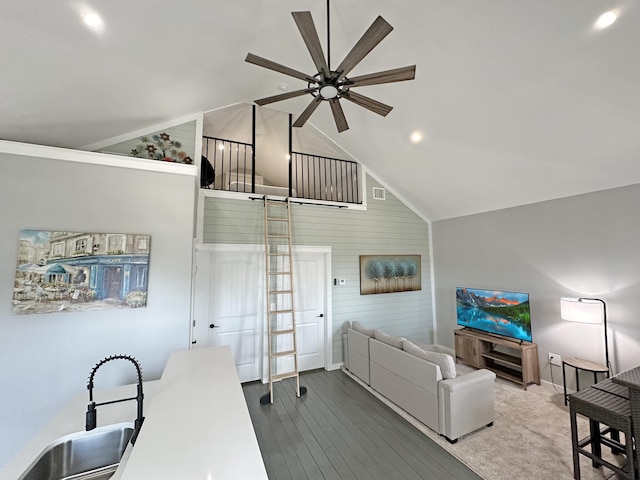 living area with visible vents, high vaulted ceiling, dark wood-style floors, baseboards, and ceiling fan