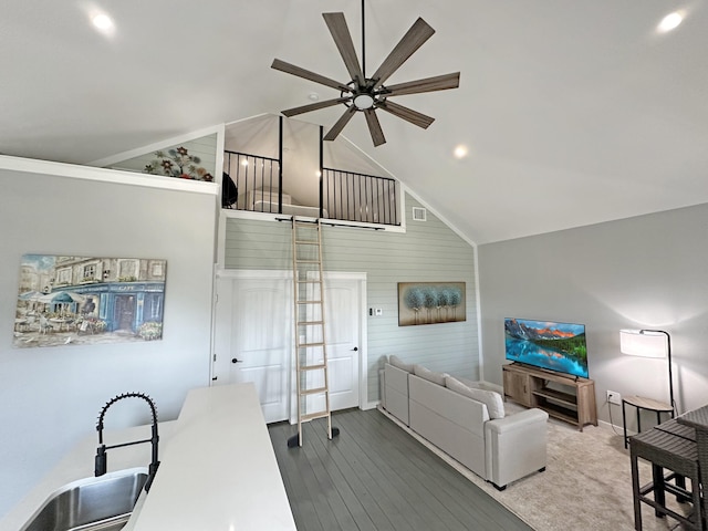 1040 Johnson Rd, Gilchrist, TX 77617 - living room featuring high vaulted ceiling, baseboards, dark wood-style floors, visible vents, and ceiling fan