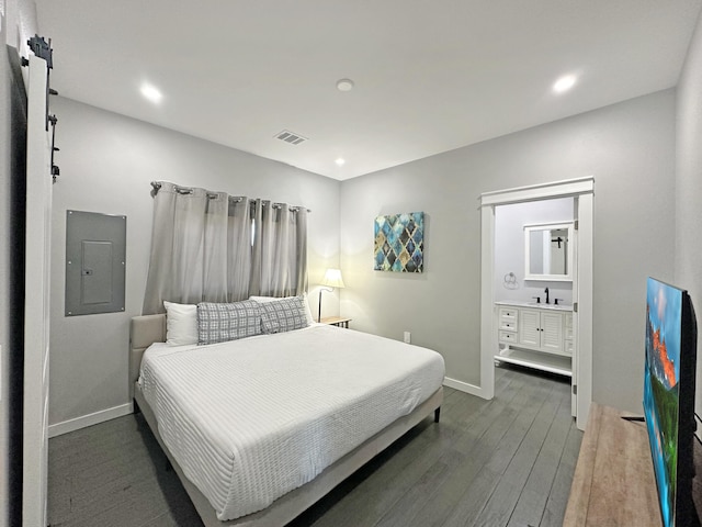 bedroom featuring visible vents, baseboards, electric panel, dark wood-style floors, and a sink