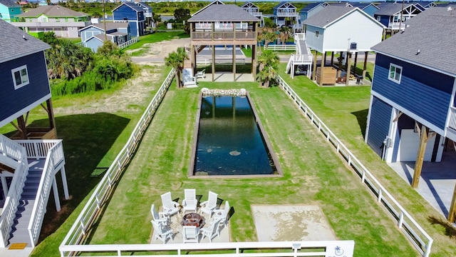 1040 Johnson Rd, Gilchrist, TX 77617 - exterior space featuring a residential view, a water view, and fence