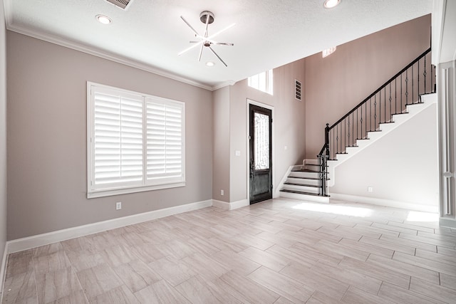 entryway featuring visible vents, baseboards, stairs, recessed lighting, and an inviting chandelier