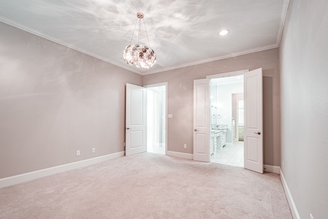 unfurnished bedroom featuring an inviting chandelier, crown molding, baseboards, and light carpet