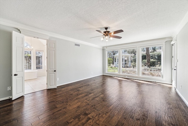 unfurnished living room with visible vents, crown molding, dark wood-type flooring, and a ceiling fan