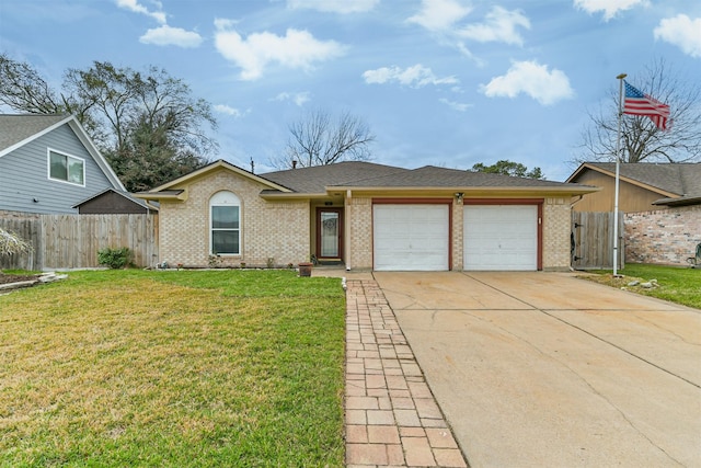 view of front of house with driveway, an attached garage, a front yard, and fence