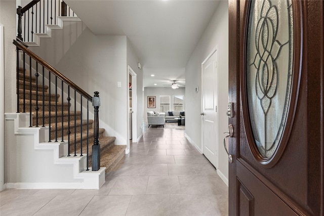 foyer with stairway, light tile patterned floors, baseboards, recessed lighting, and ceiling fan