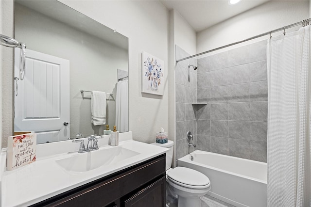 bathroom with toilet, shower / bath combo, and vanity