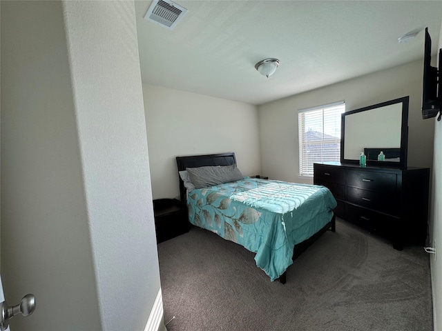 bedroom featuring visible vents and carpet flooring